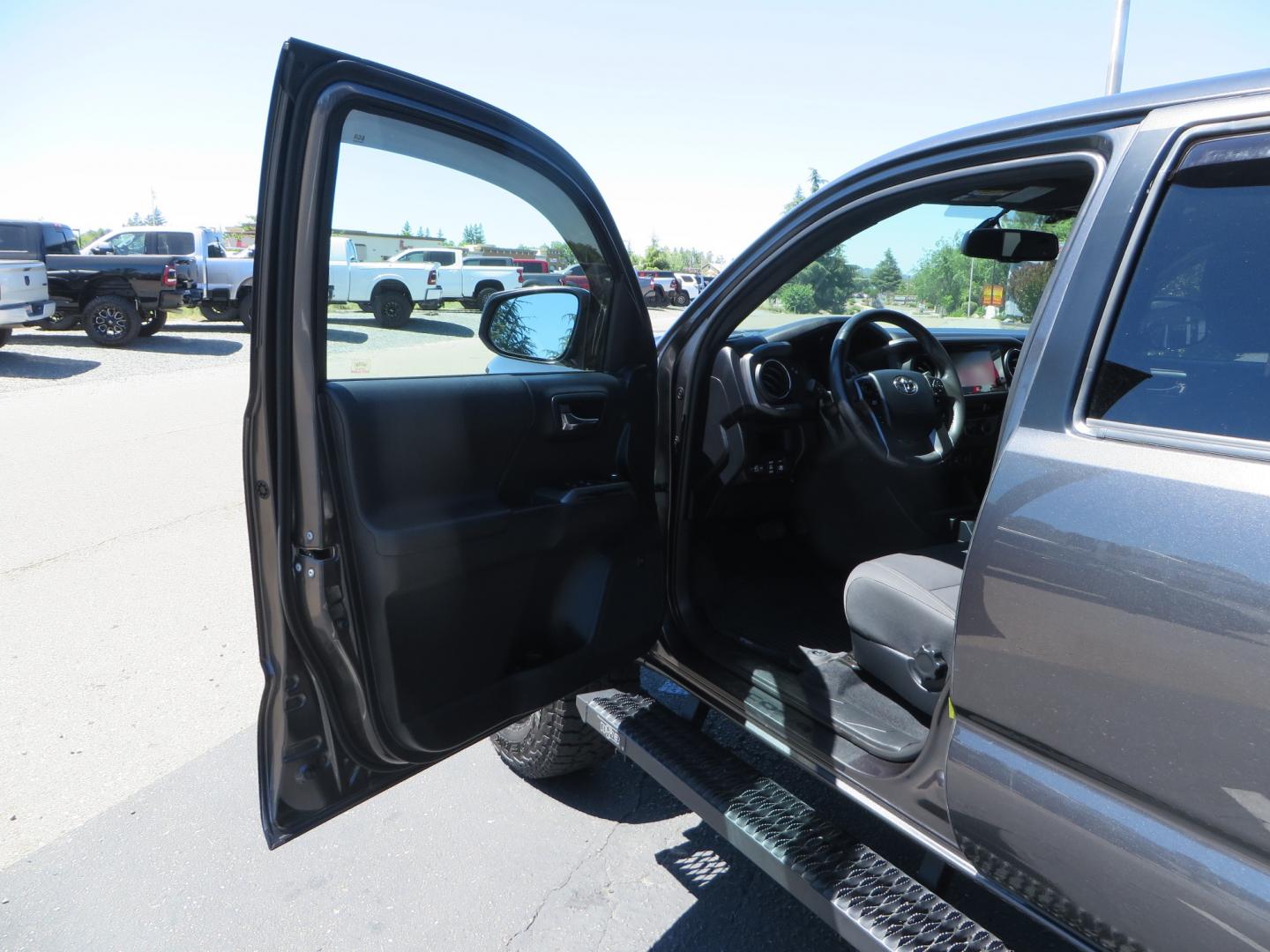 2017 CHARCOAL /GREY Toyota Tacoma TRD OFF-ROAD Double Cab Long Bed V6 6AT 4WD (3TMDZ5BN3HM) with an 3.5L V6 engine, automatic transmission, located at 2630 Grass Valley Highway, Auburn, CA, 95603, (530) 508-5100, 38.937893, -121.095482 - TRD Off-road Tacoma with a level kit, 17" Fuel Vector wheels, Falken Wildpeak AT tires, N-Fab running boards, Roll Up tonneau cover, BedRug, and window Deflectors. - Photo#15